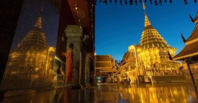 Chiang Mai: Doi Suthep & Wat Umong Twilight Tour with Pickup - The Doi Suthep night climb: Naga steps and the golden temple view