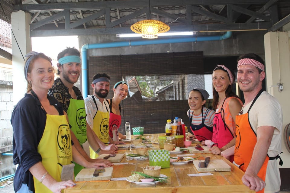 Chiang Mai: Half Day Evening Cooking Class with Market Tour - Welcome to the cooking school: your own station, plus snacks and water