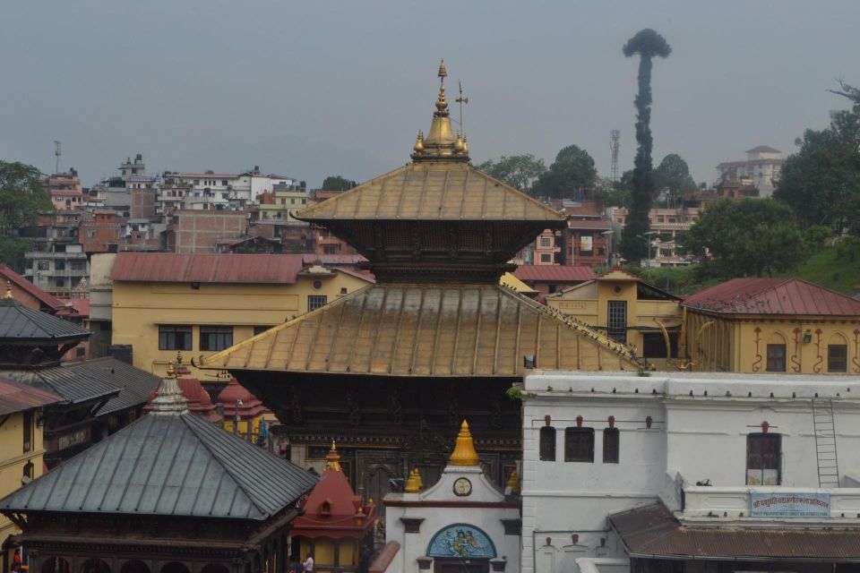 Kathmandu: Chandragiri Cable Car and Monkey Temple Tour - Swayambhunath Monkey Temple: prayer wheels and city views